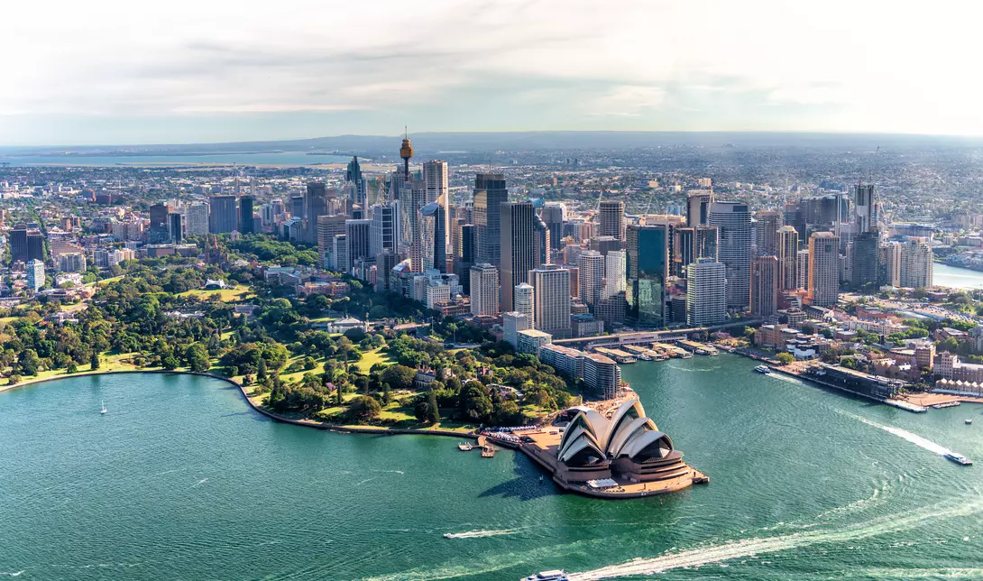 aerial view of harbour with opera house and skyline