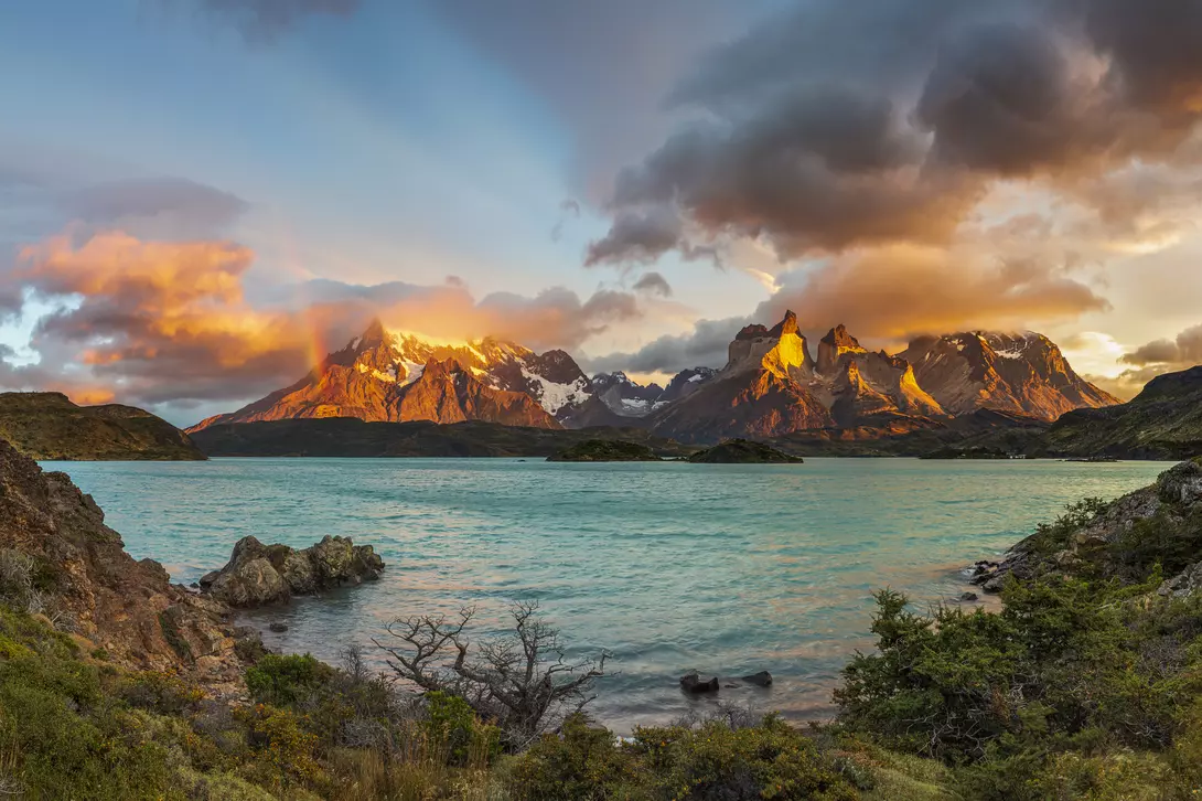 Sunrise with Rainbow in the Patagonian Andes Mountains