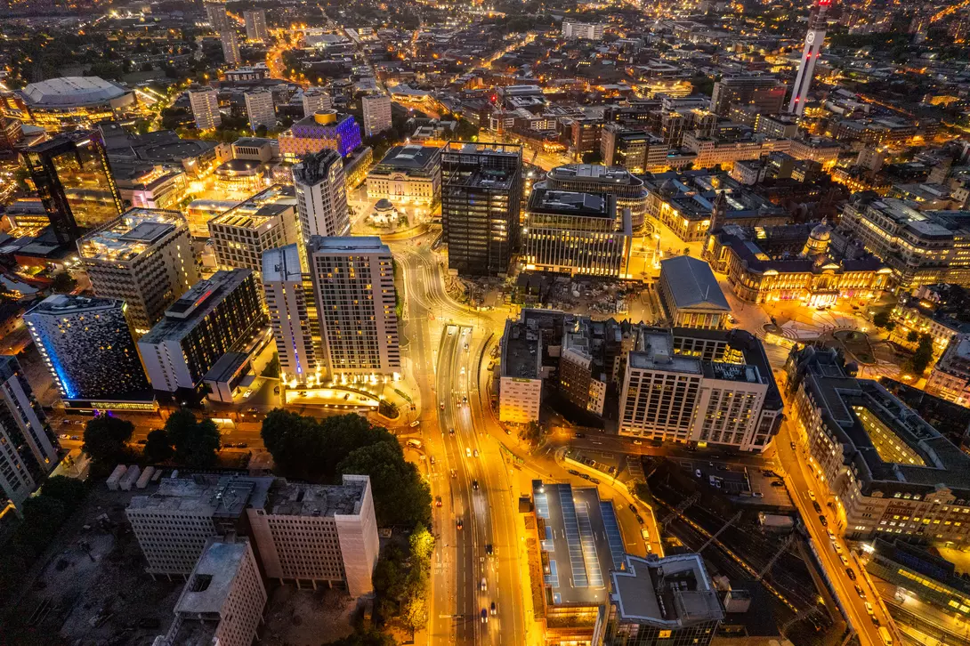 Birmingham United Kingdom Aerial view over the city center by night