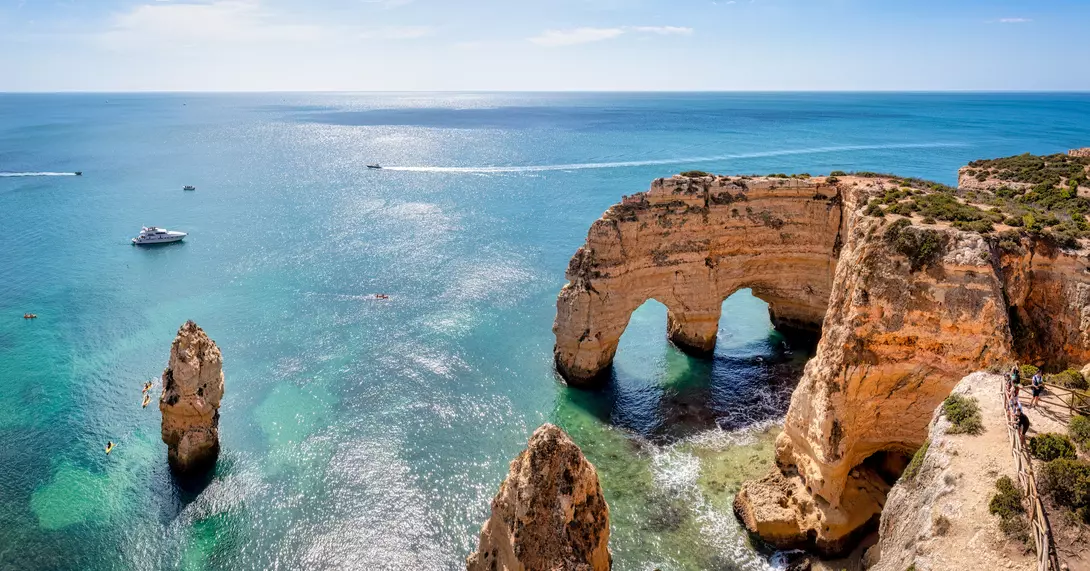 Panoramic aerial view of the Natural arch cliffs of Praia da Marinha beach in Algarve