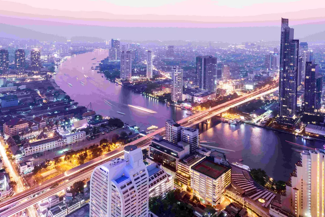 Aerial view of the Bangkok city skyline and the Chao Phraya River