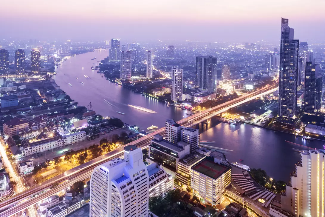Aerial view of the Bangkok city skyline and the Chao Phraya River