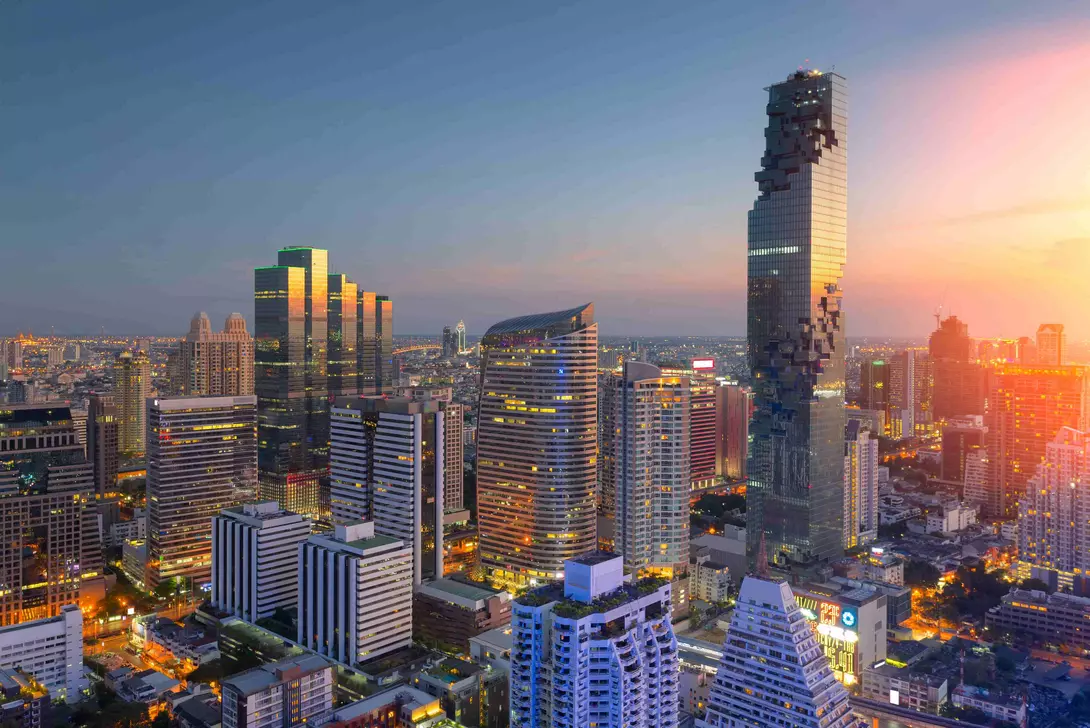 Aerial view of modern office buildings, condominium in Bangkok city downtown,Mahanakorn tower with sunset sky , Bangkok , Thailand