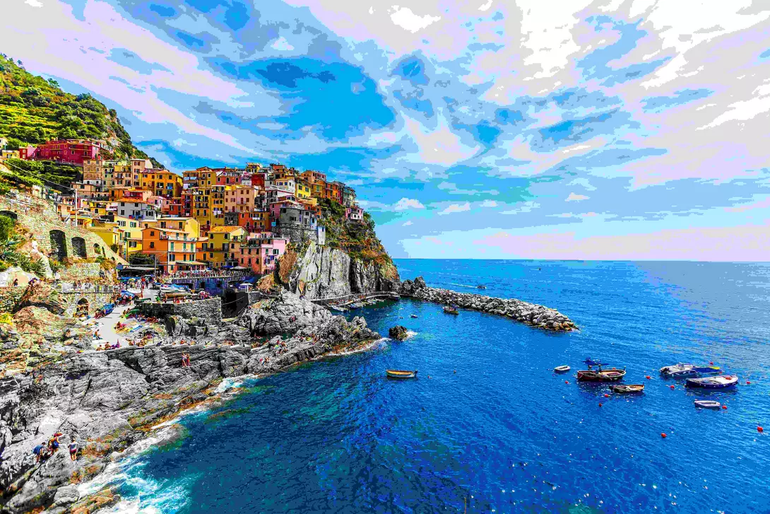 view of the colourful cliffside homes of Cinque Terre in Italy