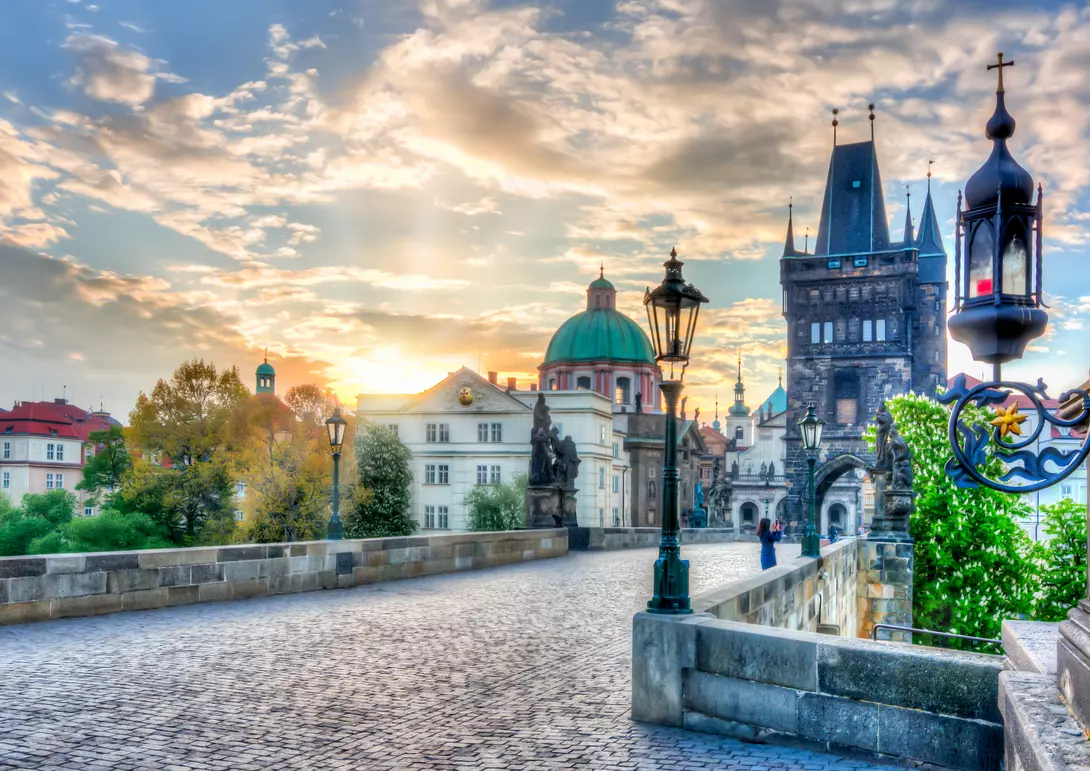 Charles Bridge (Karluv Most) at sunrise in Prague.