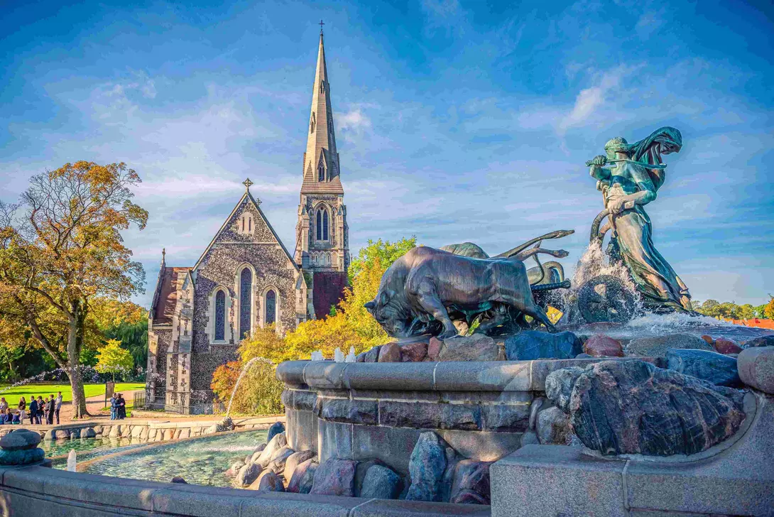The St. Albans church with the Gefion Fountain in the foreground. Copenhagen, Denmark