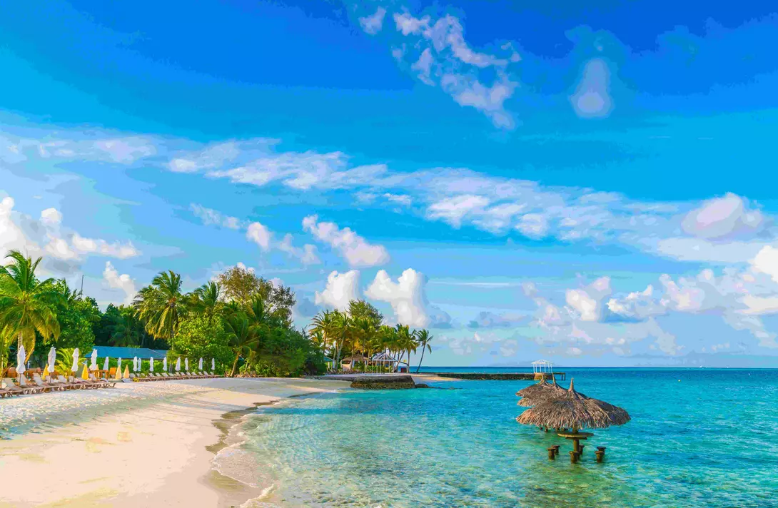 Beautiful tropical Maldives island with white sandy beach and sea