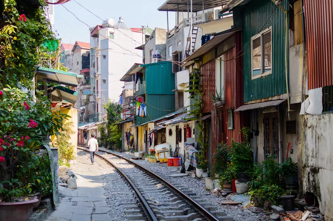 Railroad tracks on a street in the center of Hanoi, Vietnam.