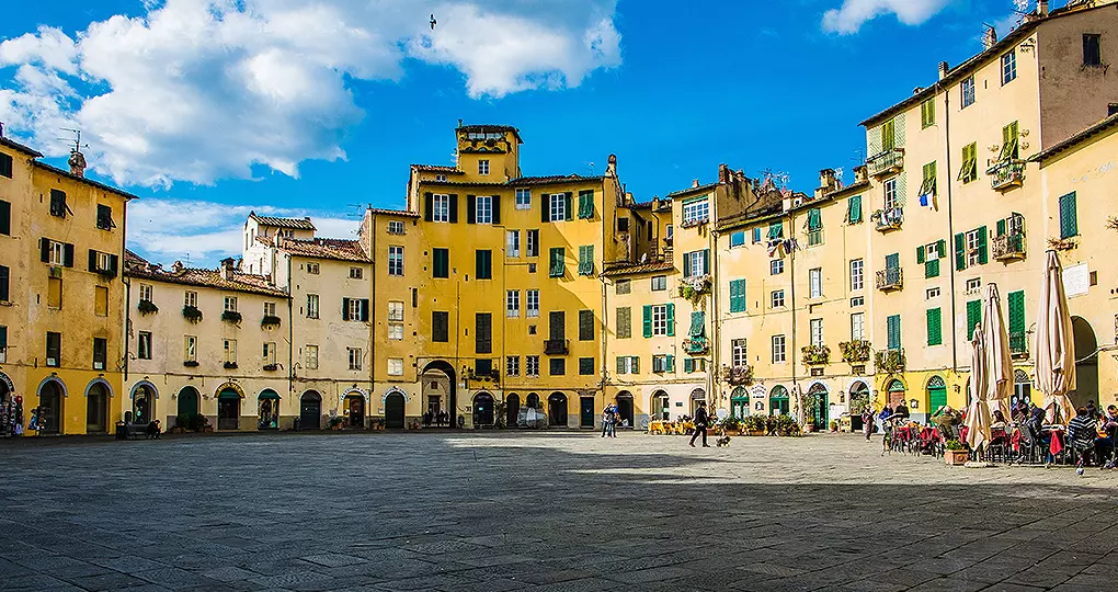 Explore the open plaza of Piazza Anfiteatro in the walled city of Lucca