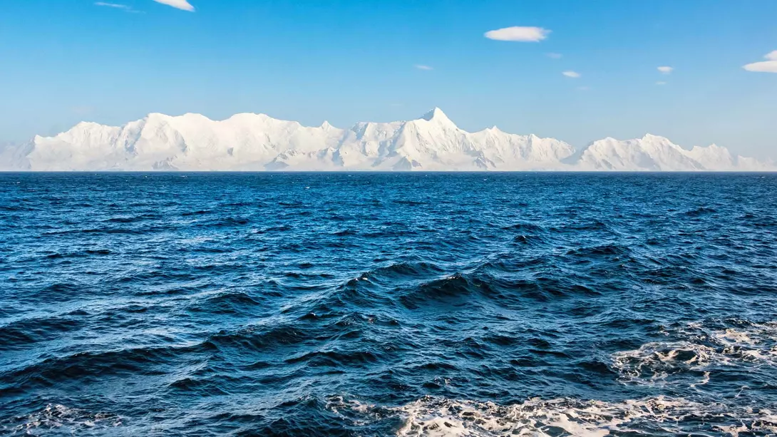 The blue waters of the Drake Passage alongside the South Shetland Islands near Antarctica.