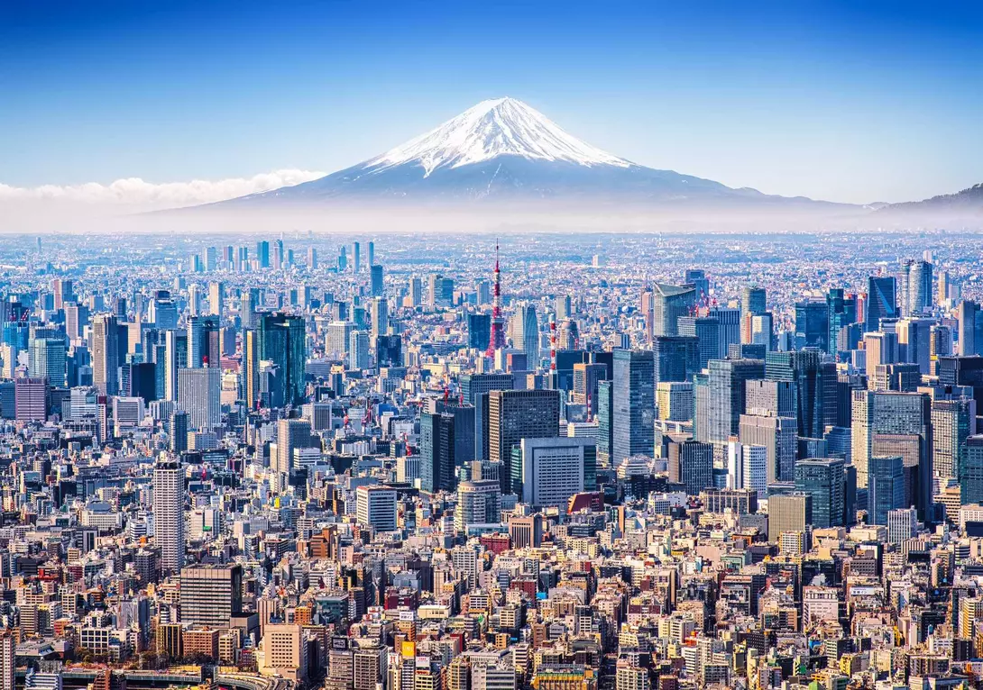 Tokyo, Japan Aerial view of Mount Fuji, Tokyo Tower and modern skyscrapers in Tokyo on a sunny day