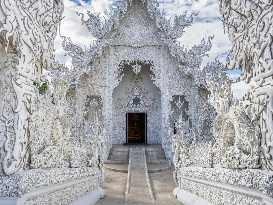 Entrance into the famous buddhist White Temple in Chiang Rai