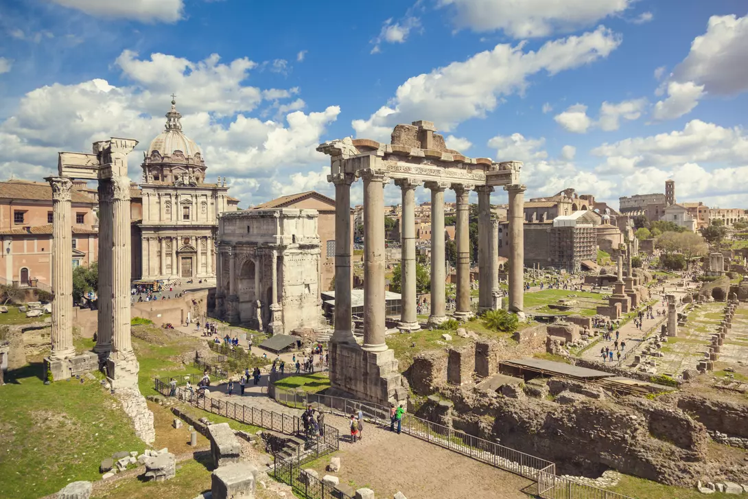 Forum Romanum in Rome, Italy. In a distance Colosseum.