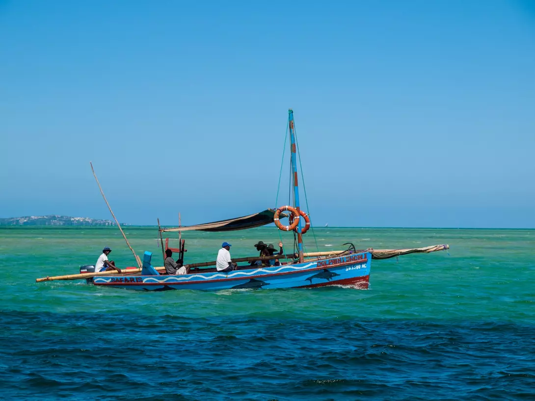 Local boat known as a Dhow goes past off the coast of Vilankulo at the Bazaruto Archipelago