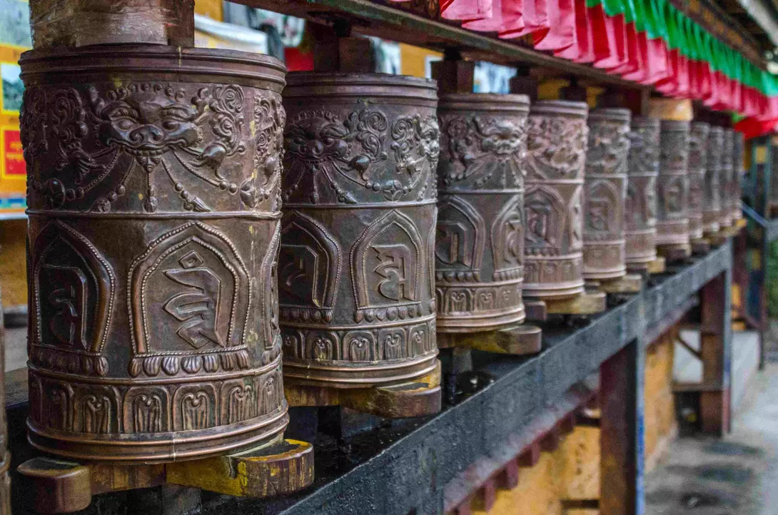 Prayer wheels at the entrance of Potala Palace