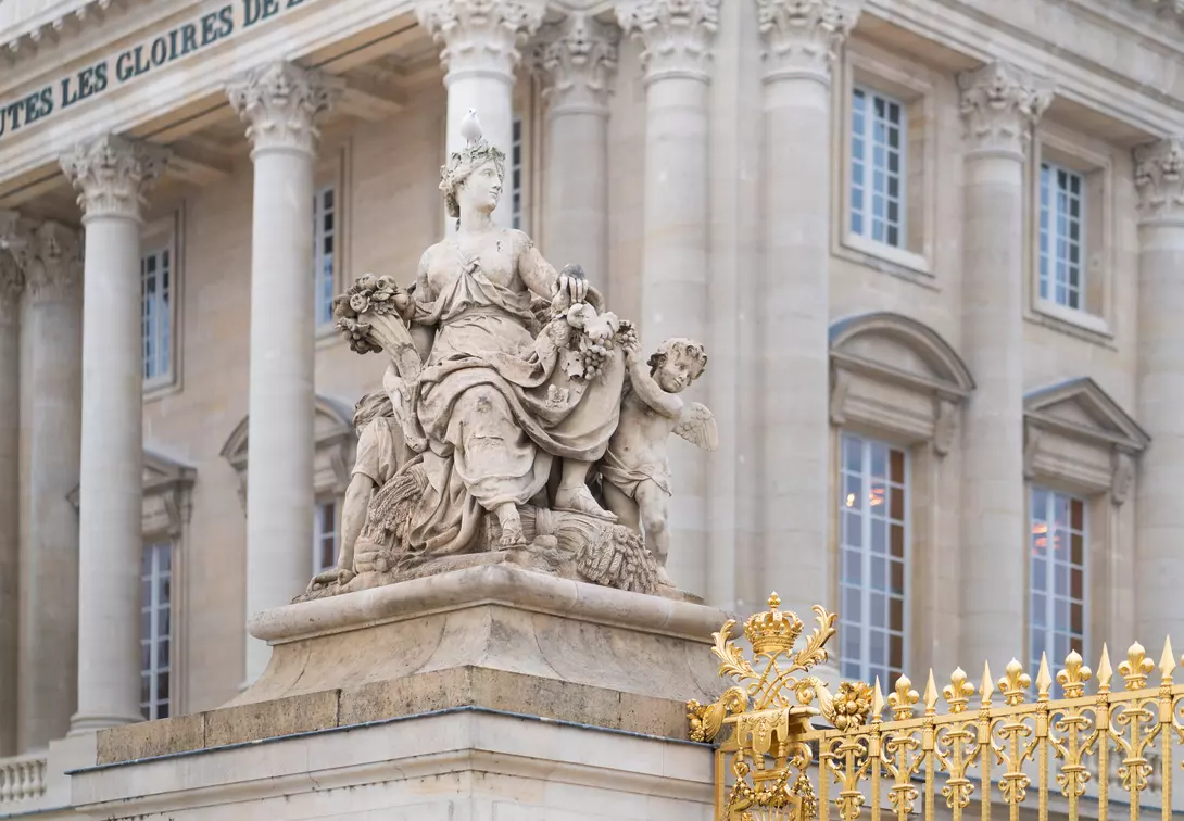 Statue at the entrance of Versailles Palace