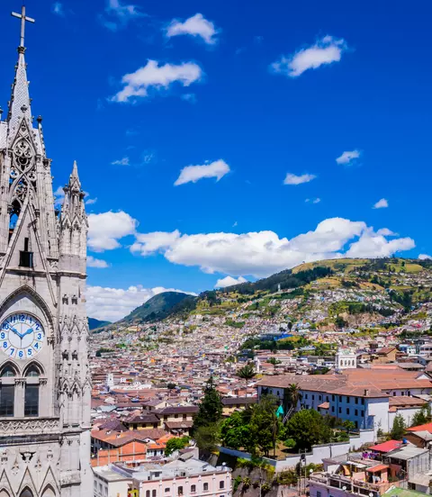 basilica in the old town of Quito against the backdrop of the hillside
