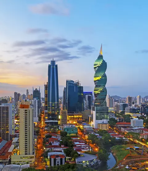 The skyline of Panama City with its skyscrapers in the financial district at sunset, Panama.