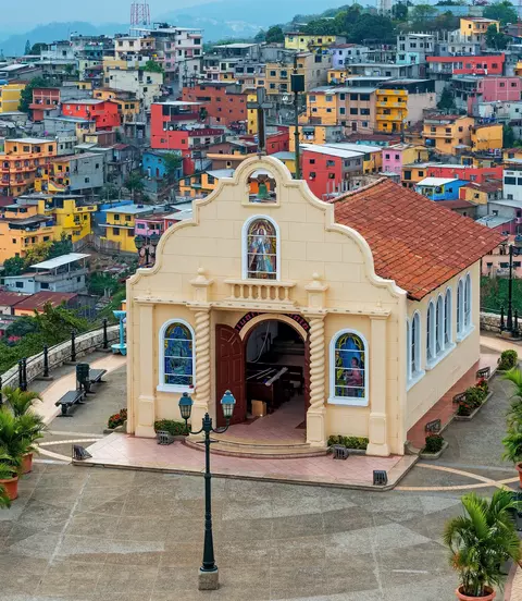 Cityscape of Santa Ana Hill Church with colorful colonial housing, Las Penas district, Guayaquil, Ecuador