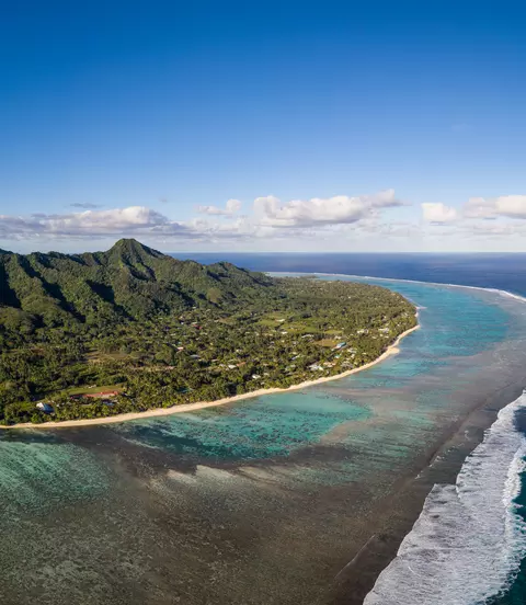 Rarotonga island, part of the Cook islands, in the Pacific ocean, with its jungle covered mountain and stunning beach