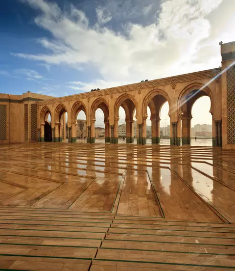Sparkling marble arcade of Hamman II Mosque on a Sunny Day
