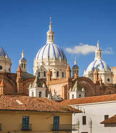 The New Cathedral of Cuenca,featuring series of sky-blue cupolas, is located in front of the Central Plaza in the Parque Calderon