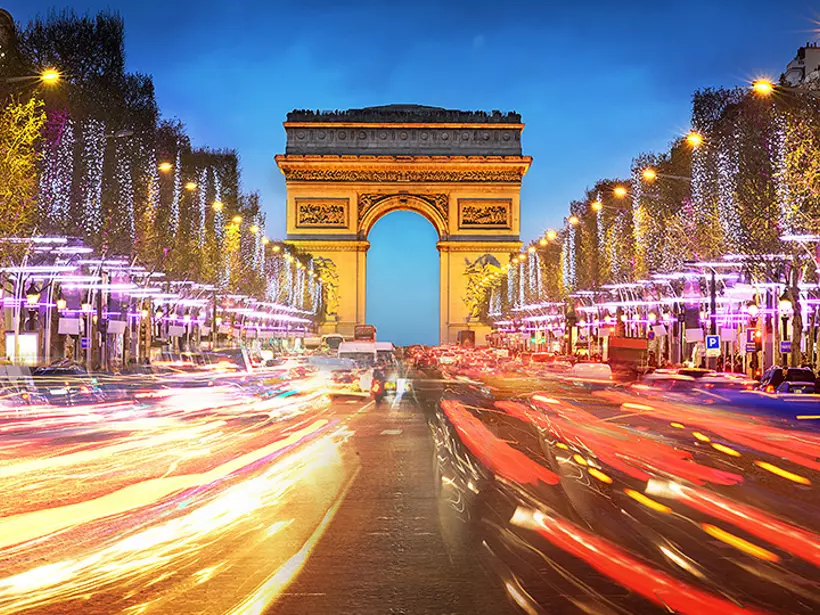Take a trip down Avenue des Champs-Elysees to admire the Arc de Triomphe up close