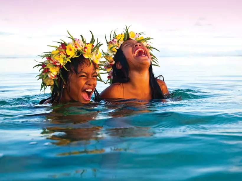 Enjoying the surf on your trip to the Cook Islands
