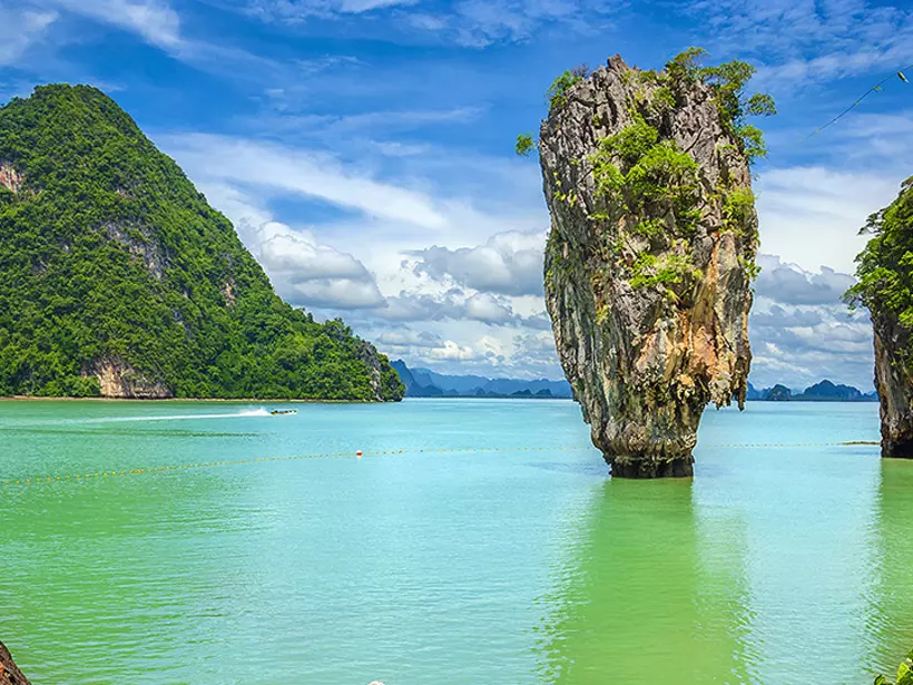 Take a winning shot at Phang Nga Bay, known for picturesque waters, sands, caverns, and rocks