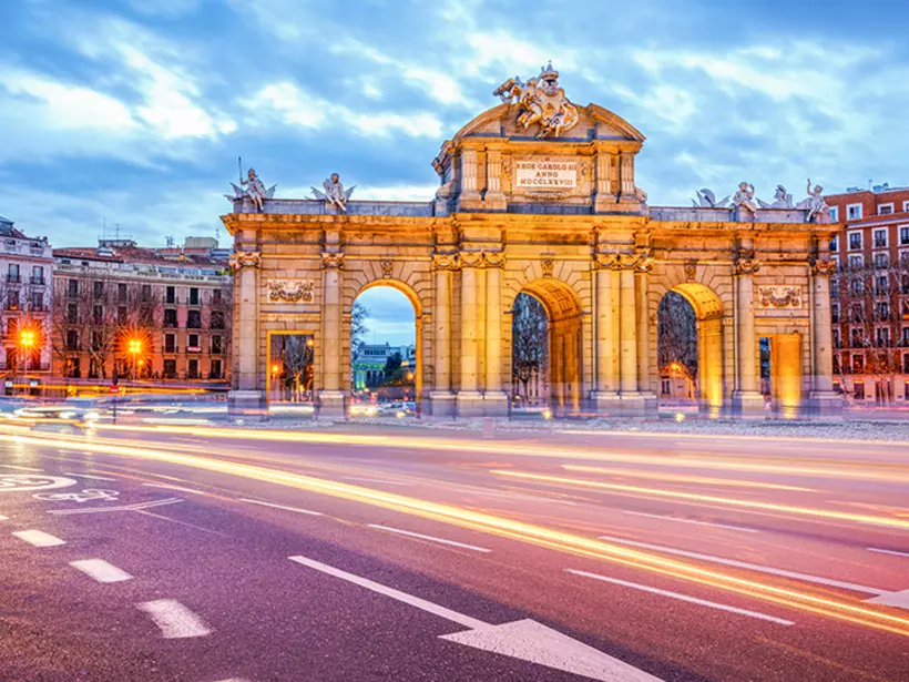 Step through the Puerta de Alcalá, one of the original five doors used by travellers to enter Madrid